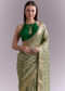Light Green Tissue Saree With Subtle Weave And Zari Border