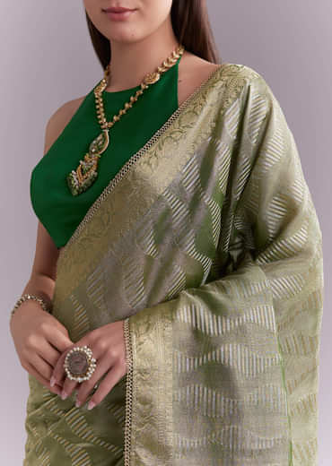 Light Green Tissue Saree With Subtle Weave And Zari Border