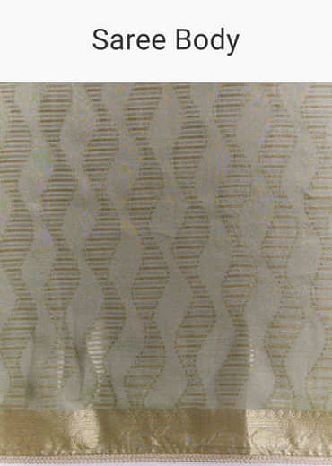 Light Green Tissue Saree With Subtle Weave And Zari Border