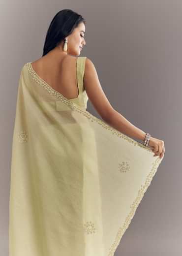 Light Pastel Green Crushed Tissue Saree With Cutdana Sequins And Beads Embroidery