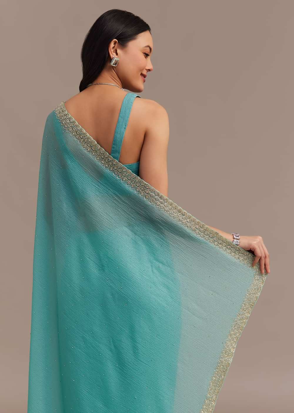 Light Blue Crushed Tissue Saree Embroidered With Cutdana And Stones