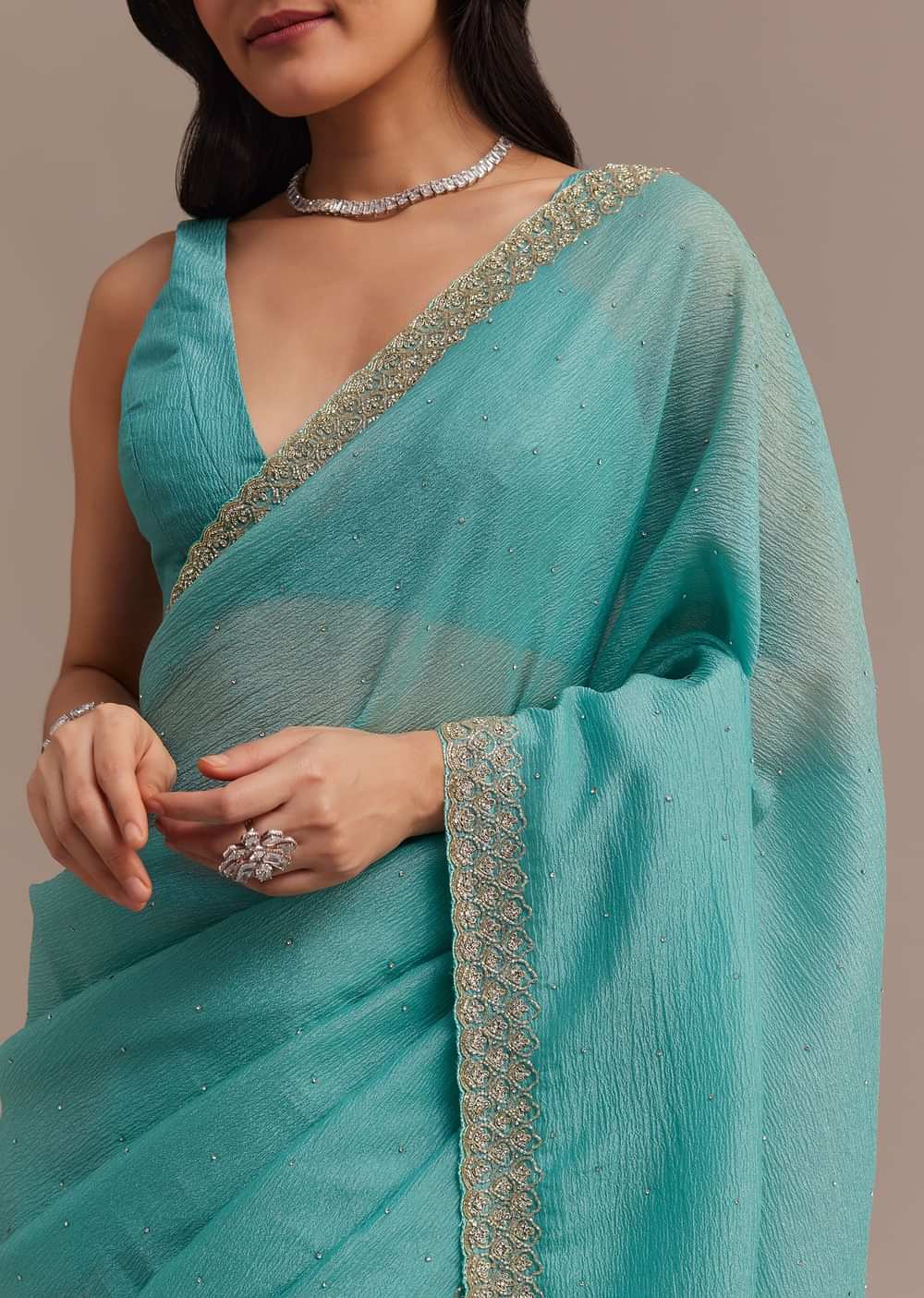 Light Blue Crushed Tissue Saree Embroidered With Cutdana And Stones