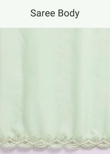 Light Green Scallop Border Saree With Unstitched Blouse