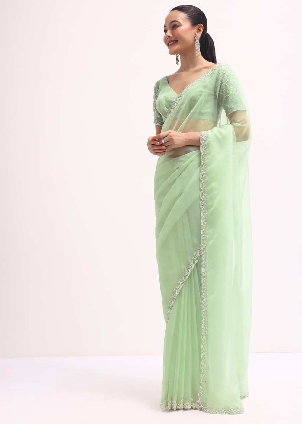 Light Green Scallop Border Saree With Unstitched Blouse
