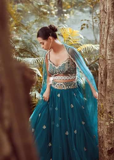 Nighttime Blue Lehenga In Net With Cut Dana And Sequins Embroidered Choli Designed With A Front Cut Out Online - Kalki Fashion
