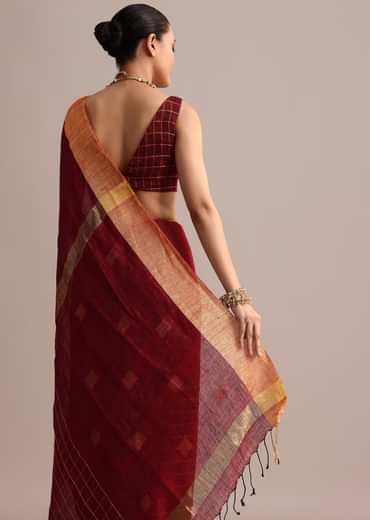 Maroon Linen Woven Saree With Zari Border And Unstitched Blouse