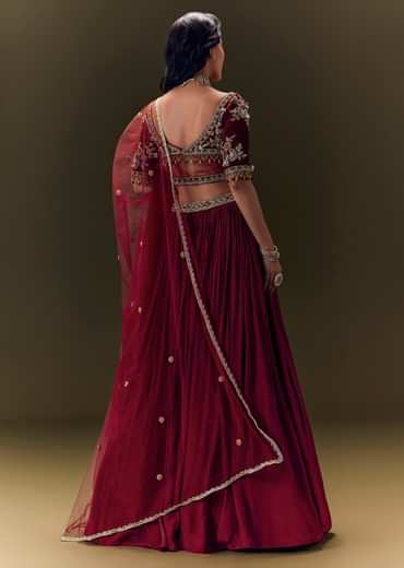 Maroon Pleated Skirt With Hand Embroidered Velvet Belt And Blouse With Net Dupatta