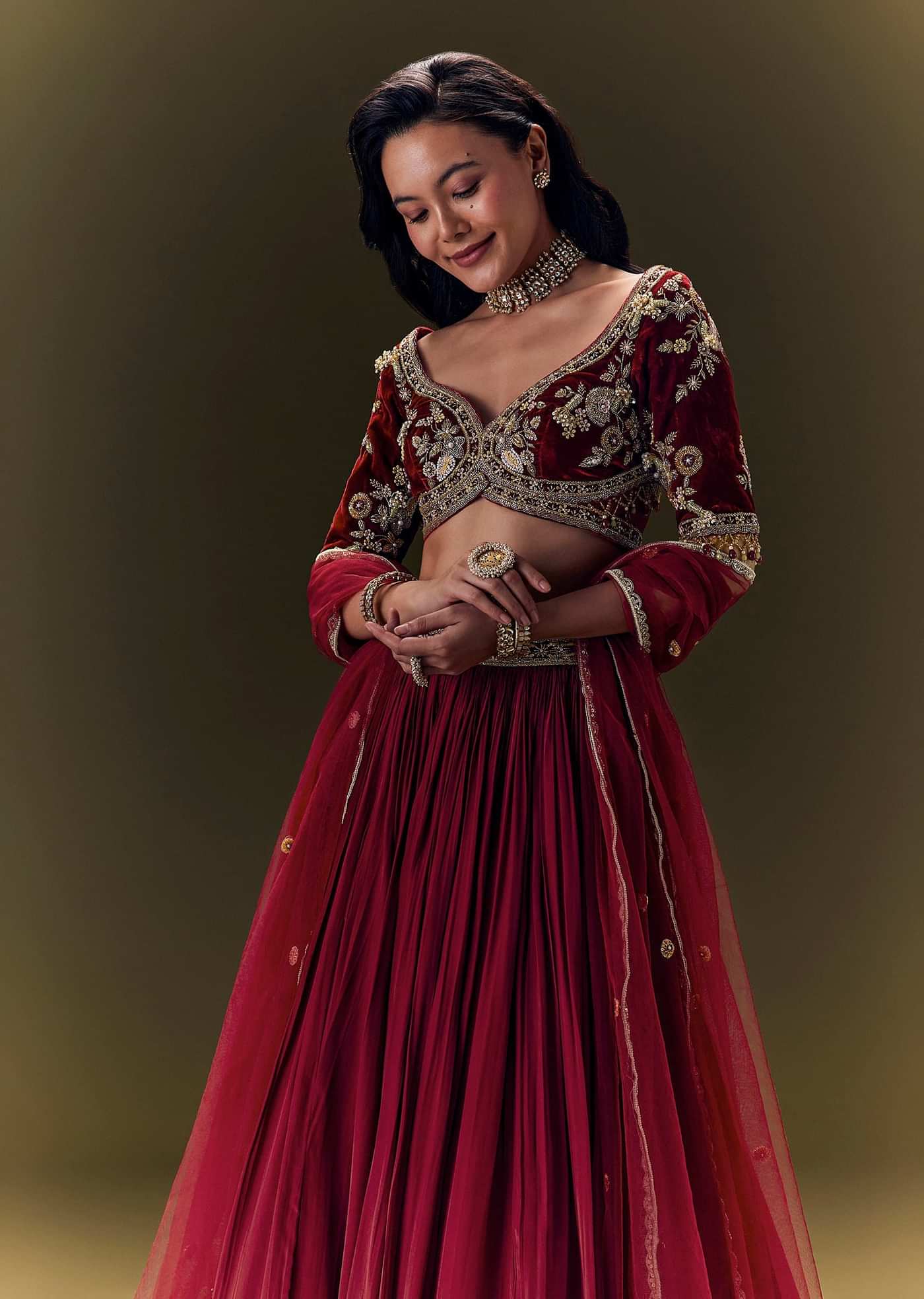 Maroon Pleated Skirt With Hand Embroidered Velvet Belt And Blouse With Net Dupatta
