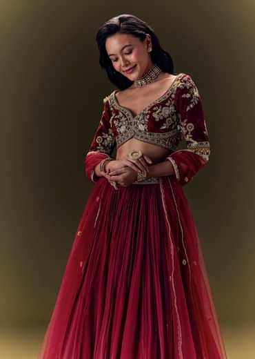 Maroon Pleated Skirt With Hand Embroidered Velvet Belt And Blouse With Net Dupatta