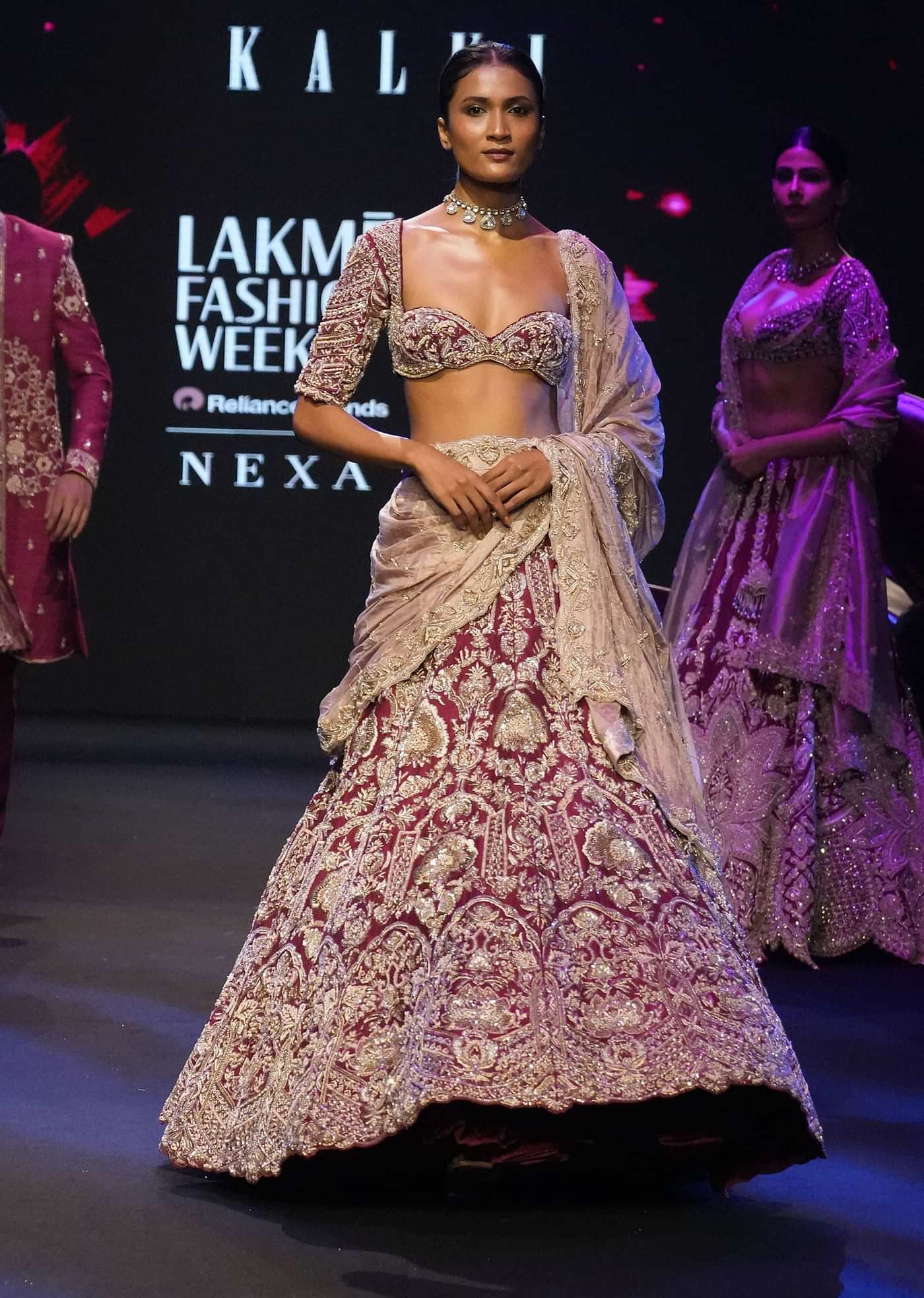 Maroon Raw Silk Hand Embroidered Bridal Lehenga With Two Dupattas