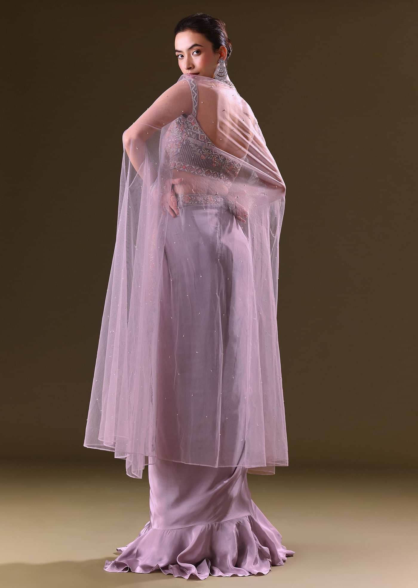 Mauve Ruffled Drape Skirt With Embroidered Blouse And Net Cape