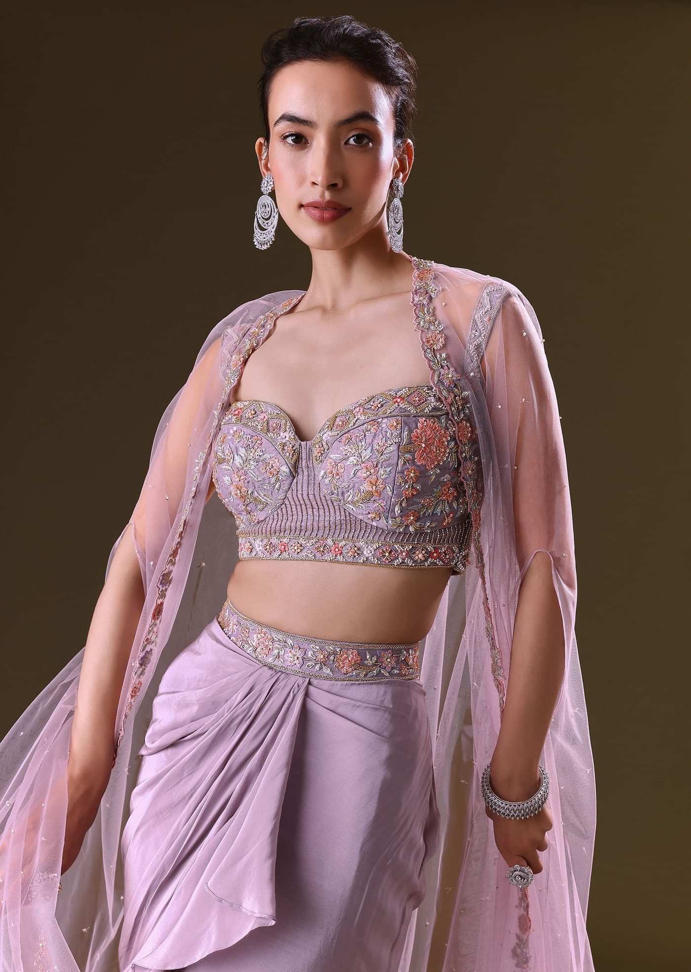 Mauve Ruffled Drape Skirt With Embroidered Blouse And Net Cape