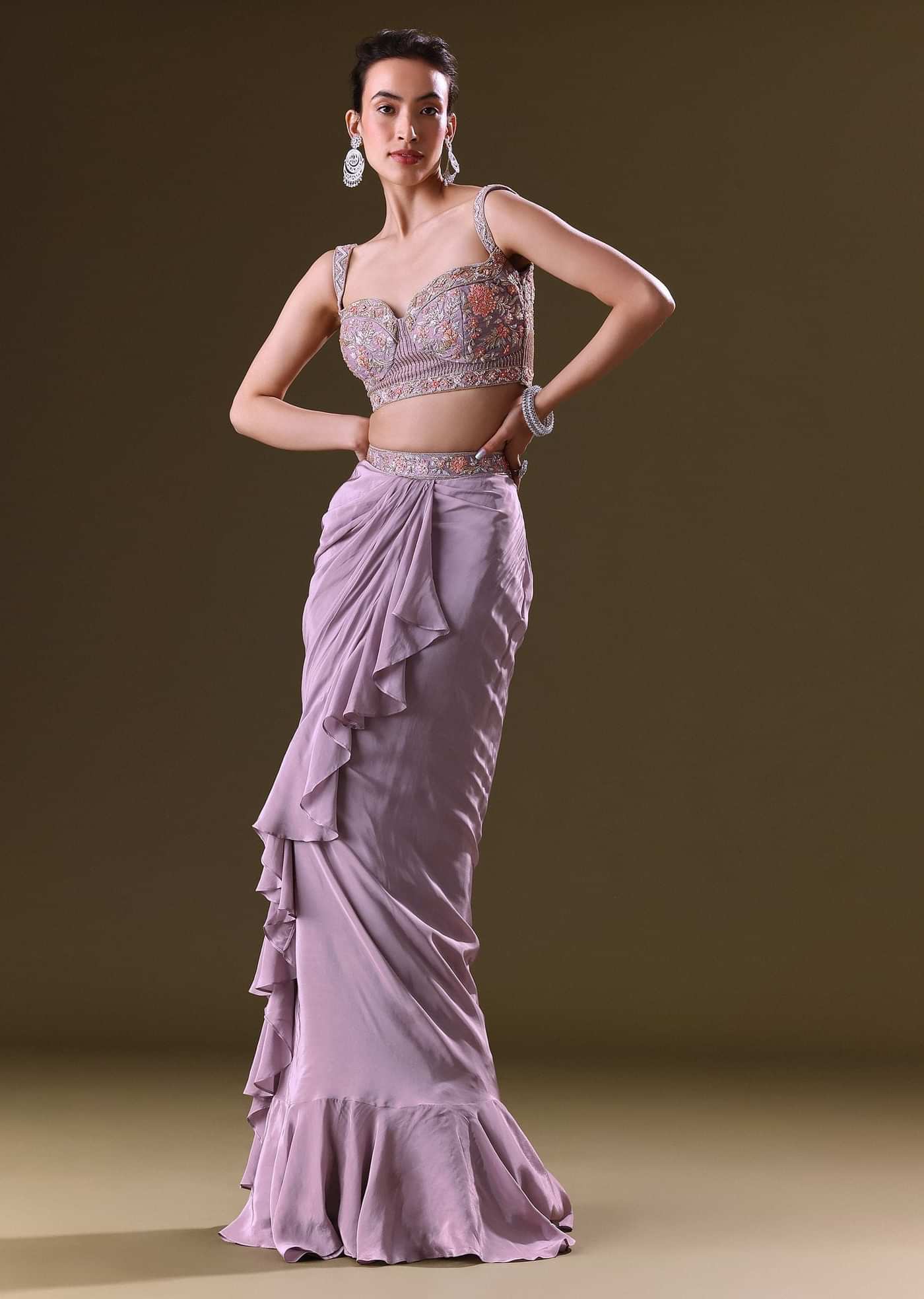Mauve Ruffled Drape Skirt With Embroidered Blouse And Net Cape