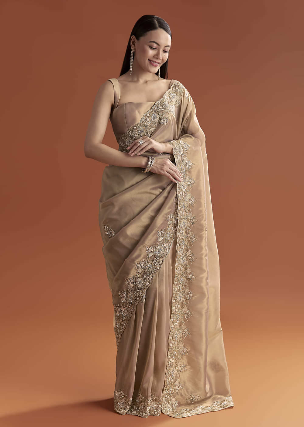 Mauve Tissue Saree With Scallop Border And Stone Embroidery
