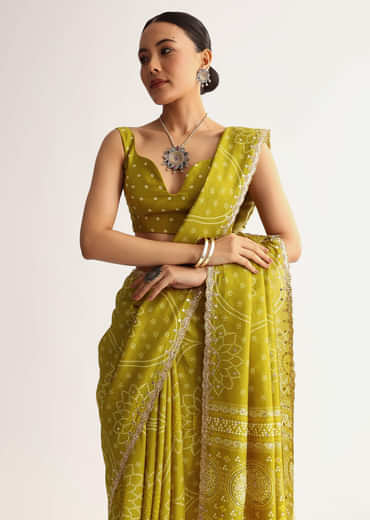 Mehendi Green Patola Printed Georgette Saree With Scallop Border