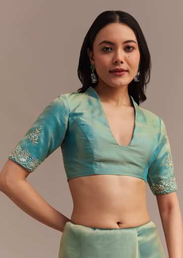 Metallic Sea Green Tissue Organza Saree With Embroidered Border