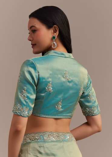 Metallic Sea Green Tissue Organza Saree With Embroidered Border