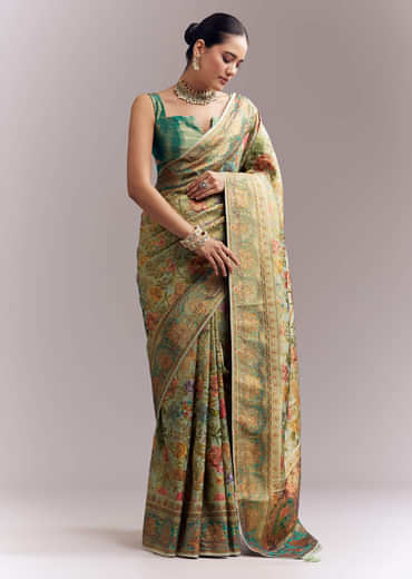 Mint Green Dola Silk Woven Saree With Embroidered Nature Motifs