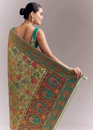 Mint Green Dola Silk Woven Saree With Embroidered Nature Motifs