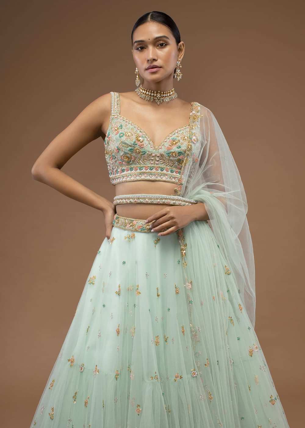 Mint Lehenga And A Crop Top Set Crafted In Net With Sequins And Resham Work