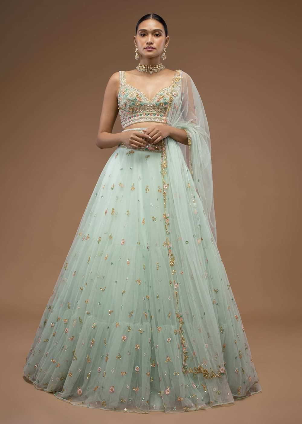 Mint Lehenga And A Crop Top Set Crafted In Net With Sequins And Resham Work