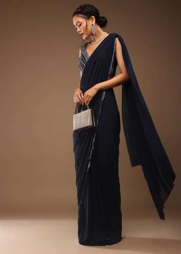 Mood Indigo Blue Ready-Pleated Saree With A Crop Top In Sequins Embroidery Corset Neckline With A Tie-Up Tassel Dori At The Back