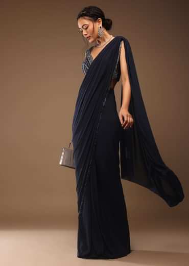 Mood Indigo Blue Ready-Pleated Saree With A Crop Top In Sequins Embroidery Corset Neckline With A Tie-Up Tassel Dori At The Back