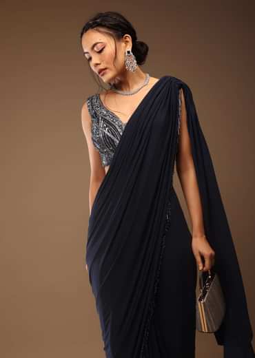 Mood Indigo Blue Ready-Pleated Saree With A Crop Top In Sequins Embroidery Corset Neckline With A Tie-Up Tassel Dori At The Back