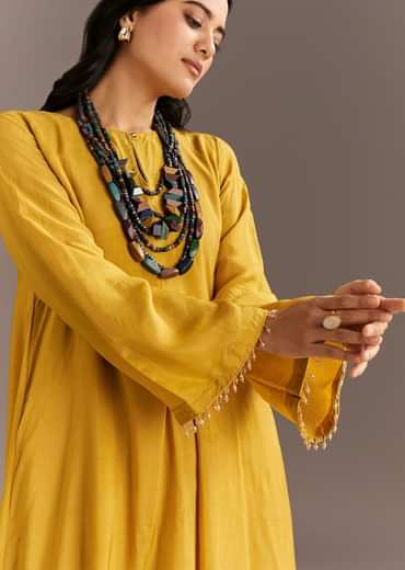 Mustard Yellow Solid Kurta Palazzo Set With Wooden Bib Neckpiece