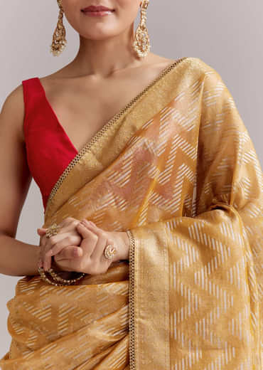 Mustard Yellow Tissue Woven Saree With Gold Tone And Zari Border