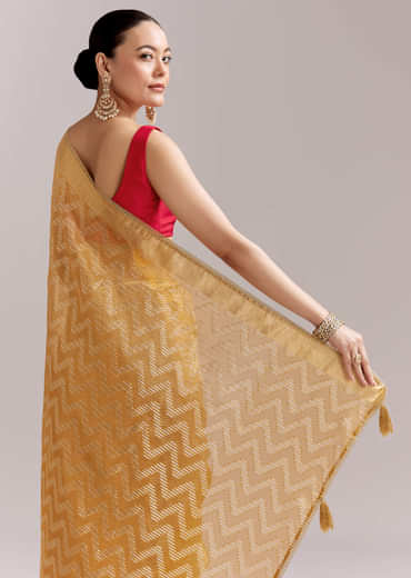 Mustard Yellow Tissue Woven Saree With Gold Tone And Zari Border