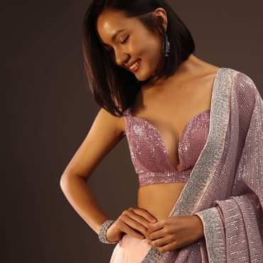 Nostalgia Rose Sequins Sleeveless Blouse With A Plunging Neckline Back Hook Closure And Padded.