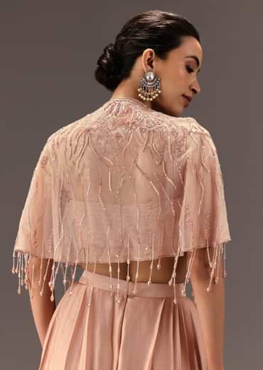 Nude Pleated Blouse With Tassel Cape And Dhoti Pants