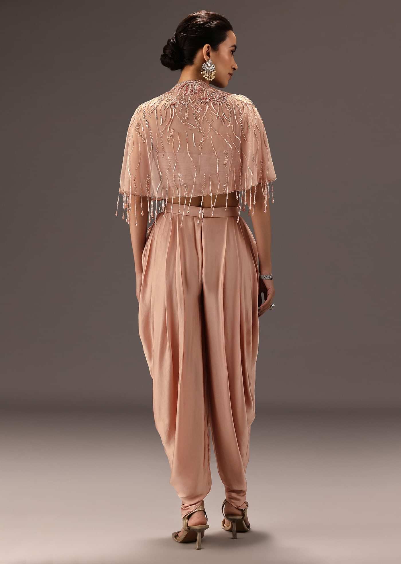 Nude Pleated Blouse With Tassel Cape And Dhoti Pants