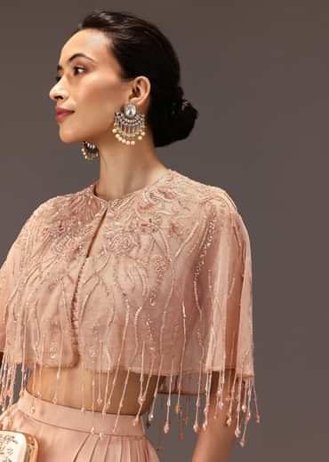 Nude Pleated Blouse With Tassel Cape And Dhoti Pants