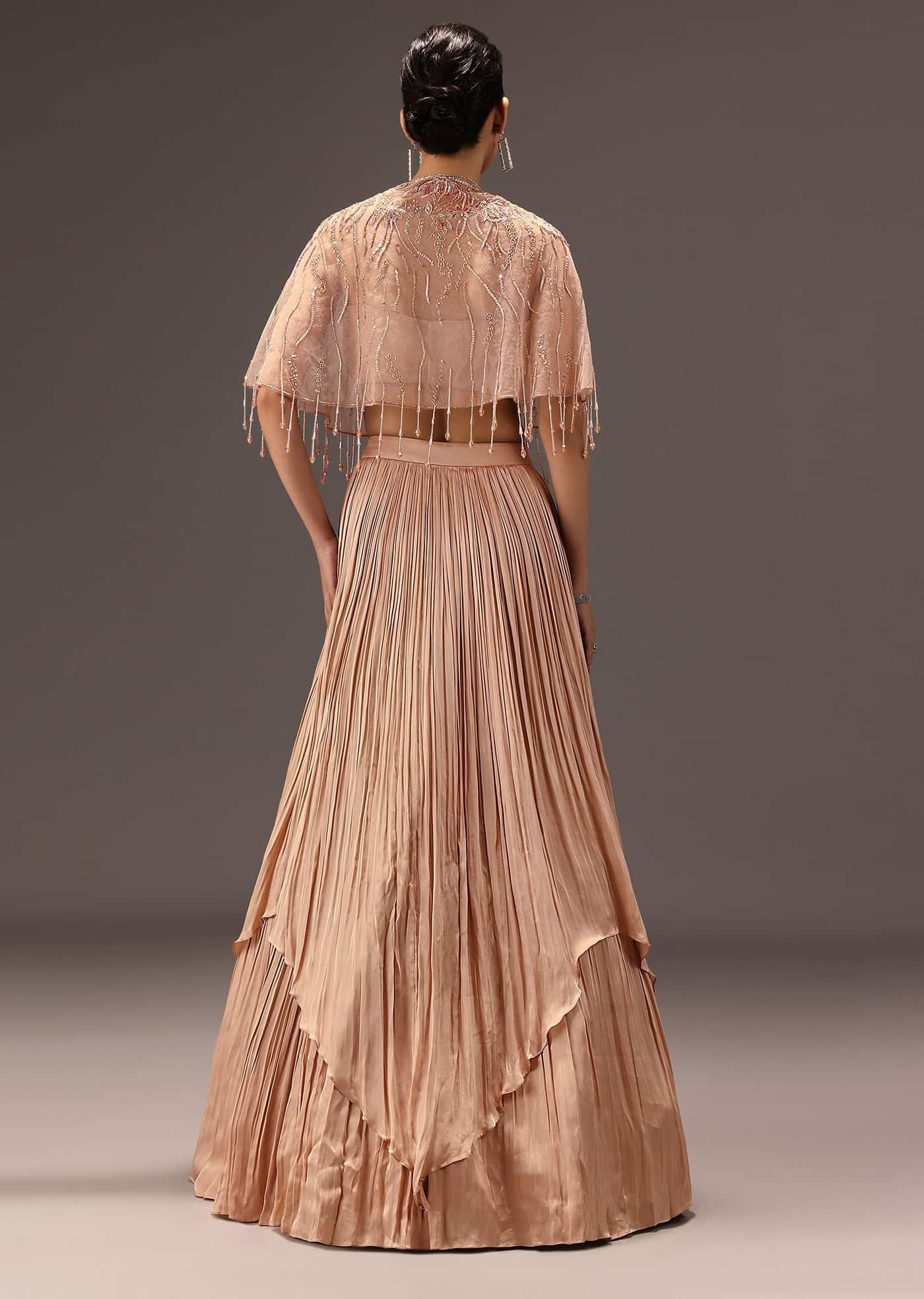 nude Ruched Blouse With Cape And Layered Skirt