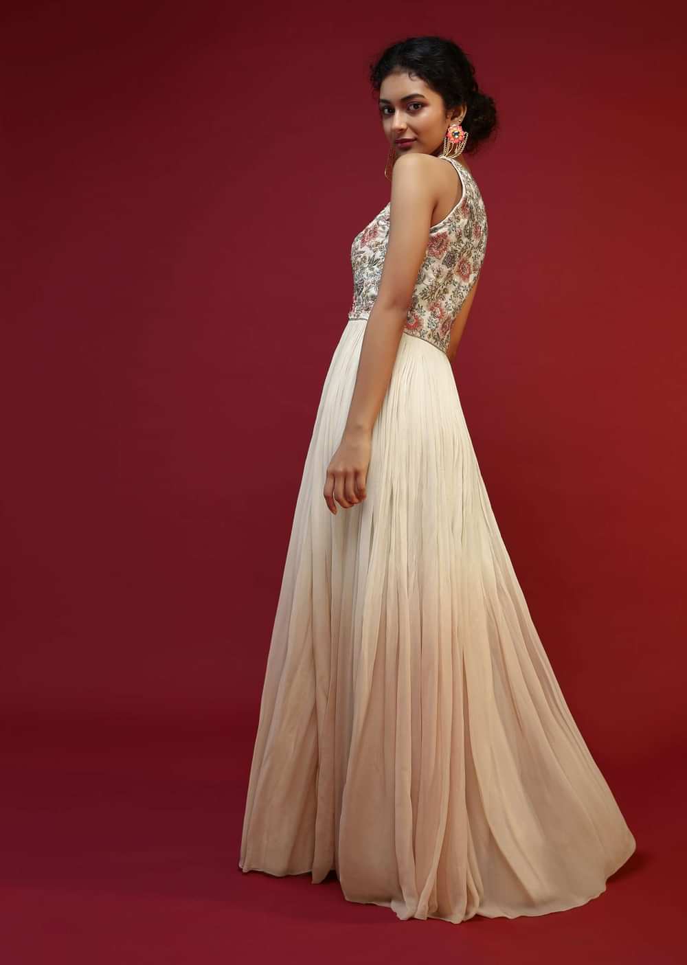 Off White Anarkali Suit With Halter Neckline And Adorned In Multicolored Hand Embroidered Floral Design On The Bodice