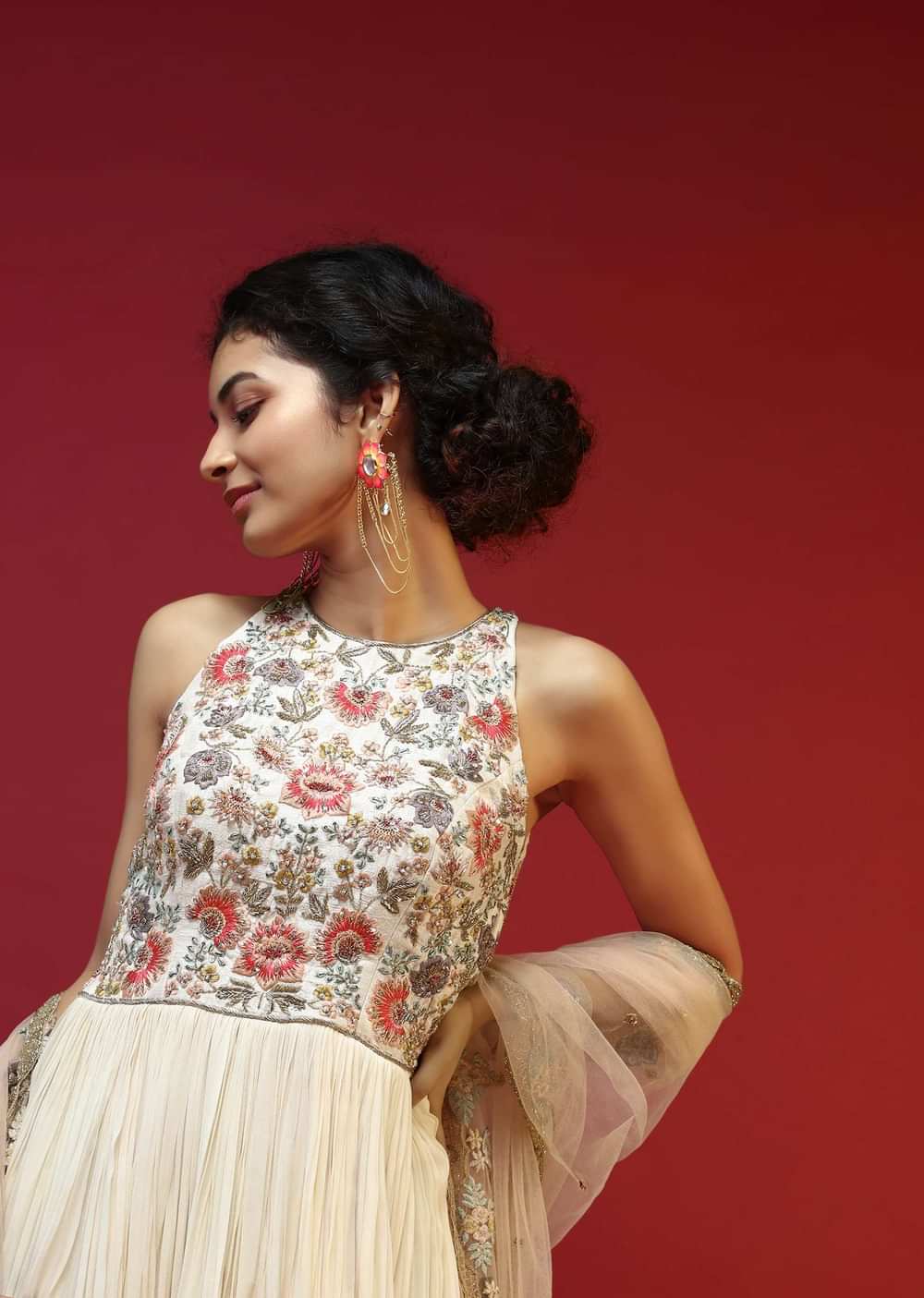 Off White Anarkali Suit With Halter Neckline And Adorned In Multicolored Hand Embroidered Floral Design On The Bodice