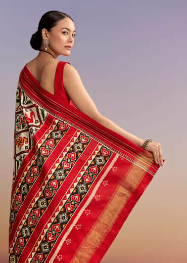 Off White And Ruby Red Double Ikkat Handwoven Patola Saree