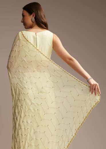 Off White Chinon Saree with Cutdana and Stone Work