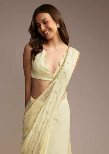 Off White Chinon Saree with Cutdana and Stone Work