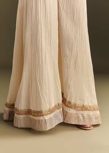 Off White Cora Cotton Asymmetrical Kurta Palazzo With Net Dupatta