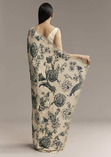 Off White Crepe Saree With Black Floral Print And Embroidered Border
