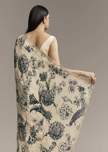 Off White Crepe Saree With Black Floral Print And Embroidered Border