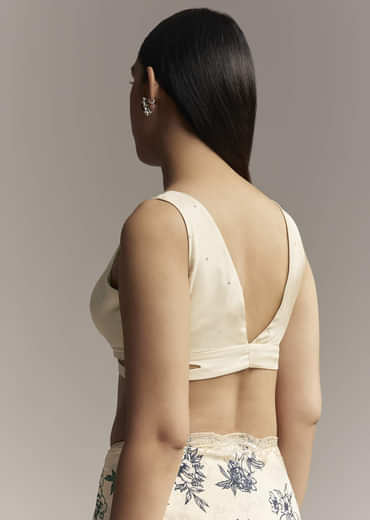 Off White Crepe Saree With Black Floral Print And Embroidered Border