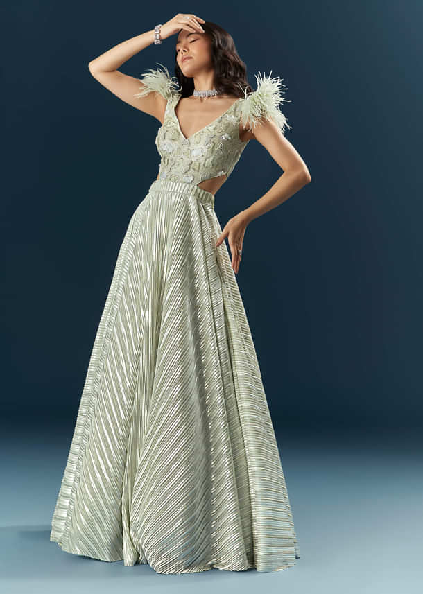 Off White Imported Lycra Bridal Gown With Heavy Embroidery And Feather Work