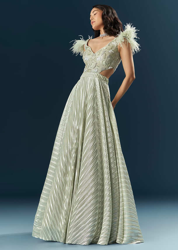 Off White Imported Lycra Bridal Gown With Heavy Embroidery And Feather Work