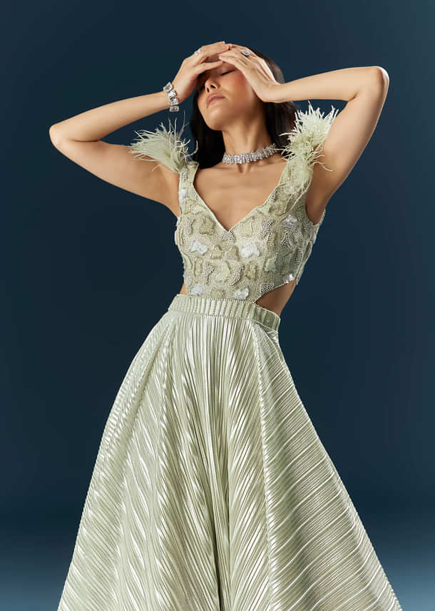 Off White Imported Lycra Bridal Gown With Heavy Embroidery And Feather Work