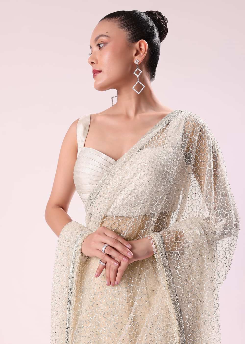 Off White Fancy Sequence Net Saree With Pleated Stitched