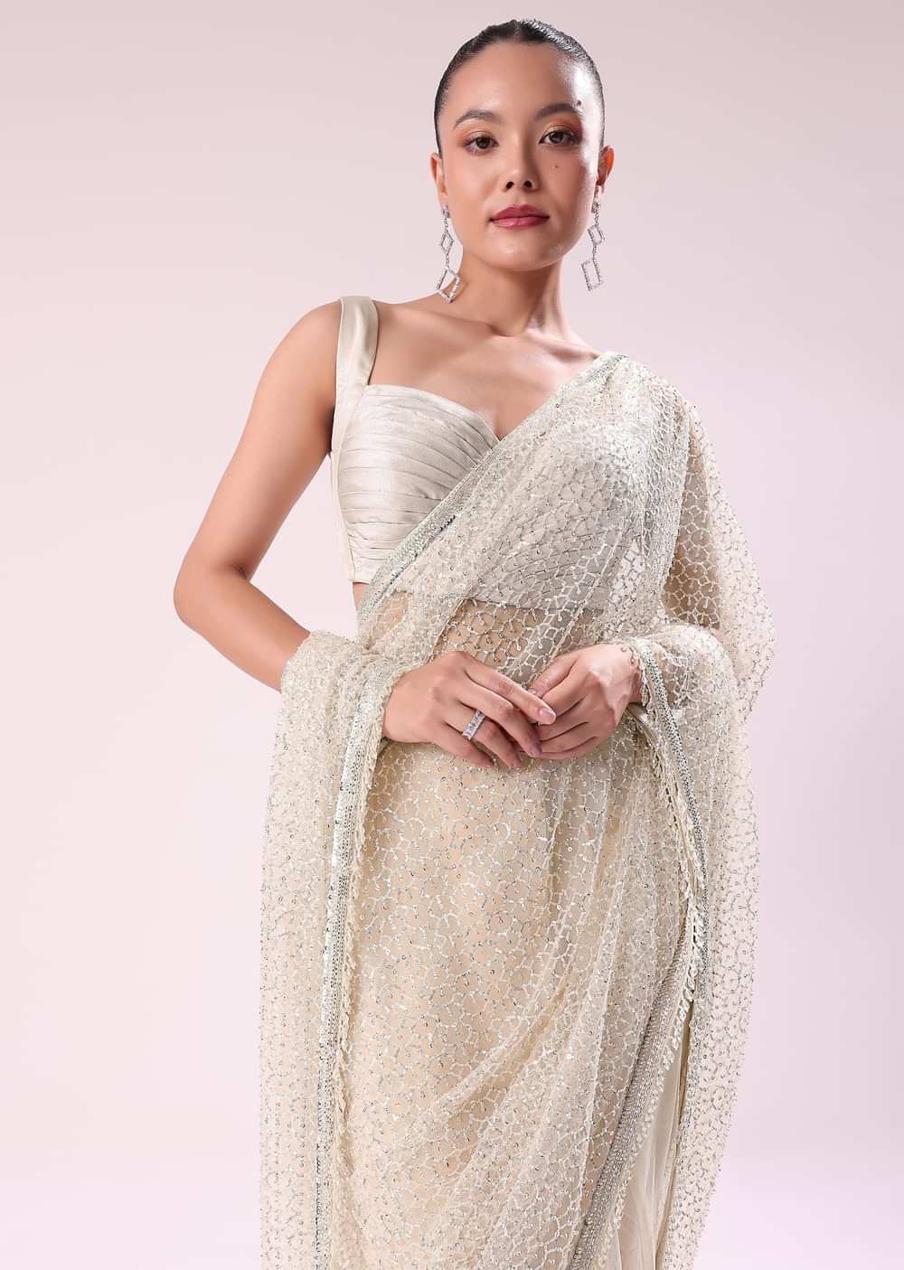 Off White Fancy Sequence Net Saree With Pleated Stitched